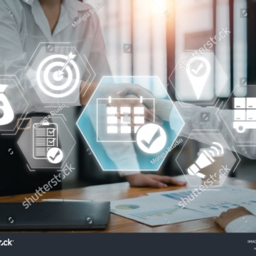 stock-photo-business-professionals-shaking-hands-with-event-management-icons-overlay-symbolizing-planning-2511308797