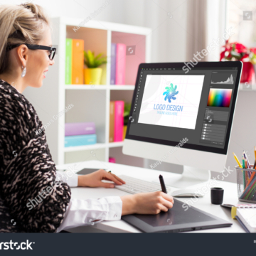 stock-photo-graphic-design-artist-working-on-client-s-logo-design-1896724780