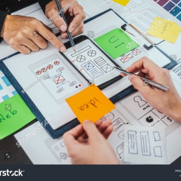 stock-photo-ui-ux-designers-developers-group-team-meeting-often-fill-variety-of-roles-in-prototyping-product-2351705247