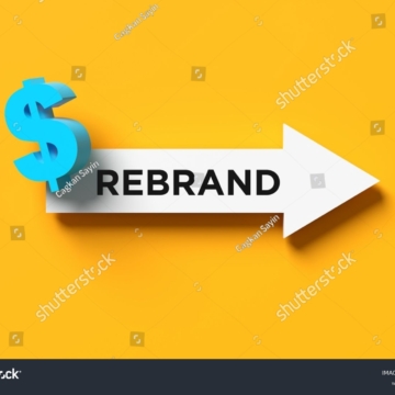 stock-photo-white-arrow-with-rebrand-text-and-dollar-sign-pointing-forward-on-yellow-background-representing-2567221731